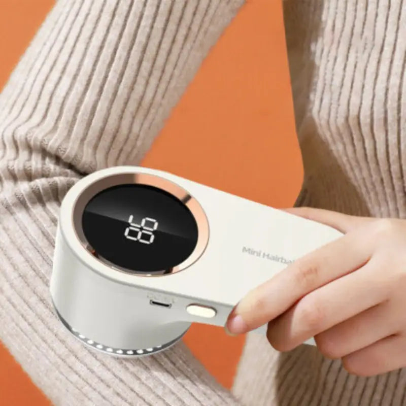 Electric Lint Remover / مزيل الوبر الكهربائي